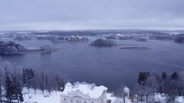 Aerial Slow Motion Uzutrakis Manor Surrounded Frozen Trees Galve Lake — Stock Video