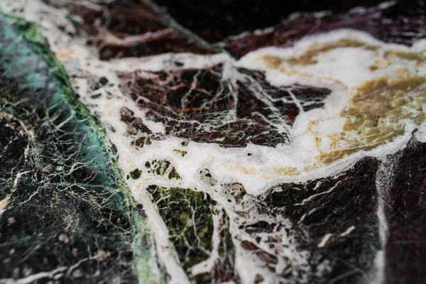 Una Macro Messa Fuoco Della Texture Una Pietra Marmo Colorata — Foto Stock