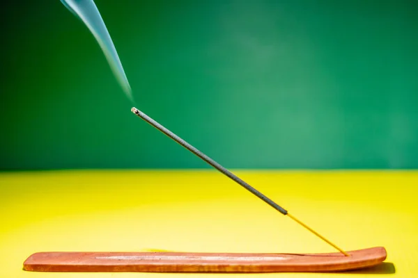 Incense Stick Wooden Stand Isolated Green Yellow Background — Stock Photo, Image
