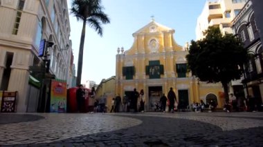 Macau, Çin 'deki St. Paul harabelerinde yürüyen turistlerin zaman çizelgesi..