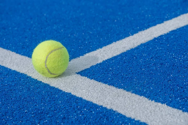 Paddle tennis ball on a paddle tennis court for background