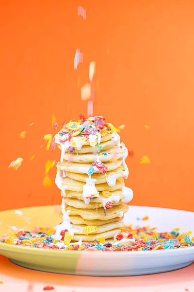 Vertical Shot Pancakes Colorful Cereal Whipped Cream Splashing Them — Stock Photo, Image