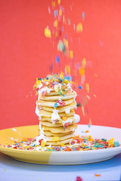 Vertical Shot Pancakes Colorful Cereal Whipped Cream Splashing Them — Stock Photo, Image