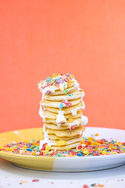 Vertical Shot Pancakes Colorful Cereal Whipped Cream Orange Background — Stock Photo, Image