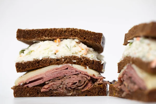 Pastrami Sandwich Sliced Half Portraying All Its Ingredients White Background — Stock Photo, Image