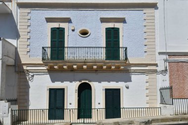 The facade of a house in Santa Cesarea Terme, an Apulian village in the province of Lecce in Italy.