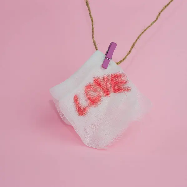 Closeup Shot Bandage Love Sign Rope Pink Background — Stock Photo, Image