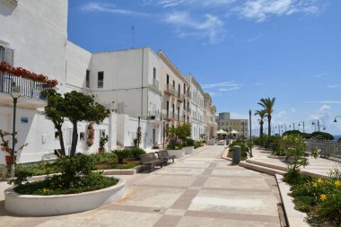 The avenue of a street in Santa Cesarea Terme, an Apulian village in the province of Lecce in Italy.