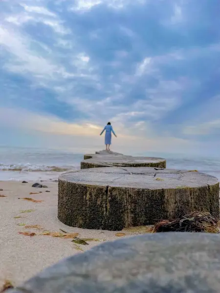 Woman Blue Dress Standing Sea Cloudy Sky — Stock Photo, Image