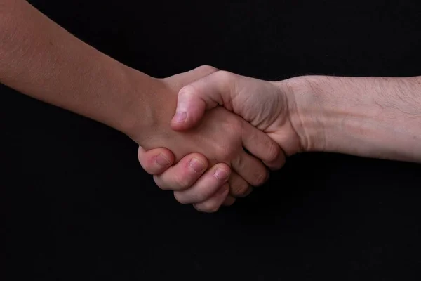 Closeup Handshake Black Background — Stock Photo, Image