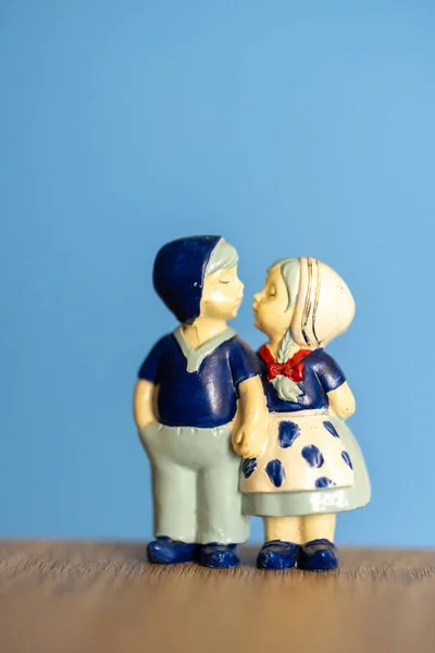 Vertical Shot Dutch Kissing Couple Figurine Standing Wooden Surface — Stock Photo, Image