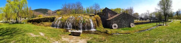 A panoramic view of waterfalls in Santa Maria del Molise, Italy on a sunny day