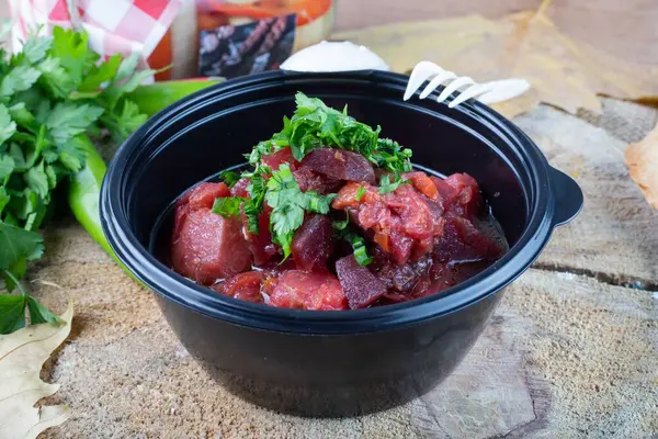 Meaty Stew Fresh Herbs Bowl Bread Green Peppers Cilantro Dried — Stock Photo, Image