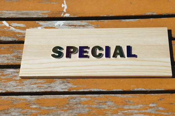 Word Special Rainbow Colored Lettering Old Rustic Orange Table Background — Stock Photo, Image