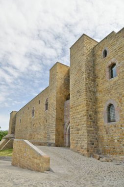 The walls of the medieval castle built by King Frederick II in a small village in the Basilicata region of Italy.