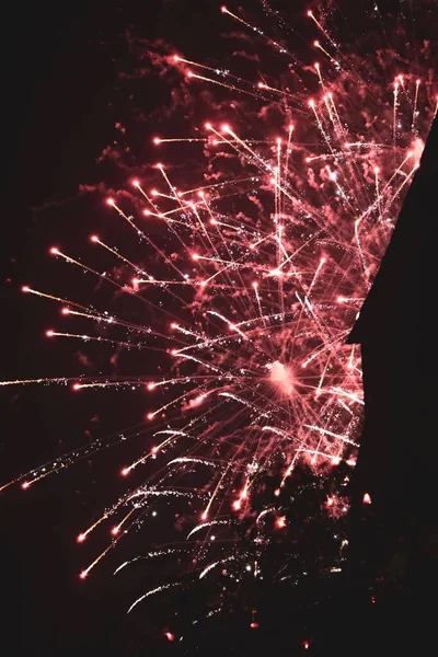 Vertical Shot Exploding Bright Red Fireworks Night Sky — Stock Photo, Image