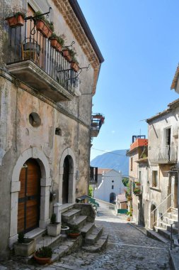 A narrow street between the old houses of Guardia Sanframondi, a village in the province of Benevento, Italy.