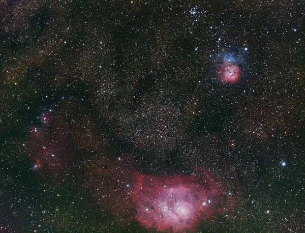 Boşluktaki Lagoon Trifid Bulutsusu — Stok fotoğraf