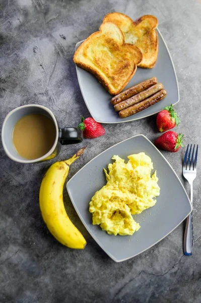 Vertical Top View Scrambled Eggs French Toasts Sausages Plates — Stock Photo, Image
