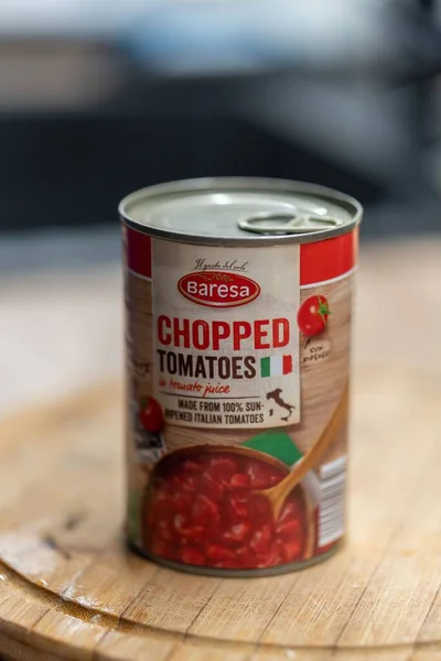 Vertical Shot Chopped Tomatoes Can Baresa Brand Wooden Table — Stock Photo, Image