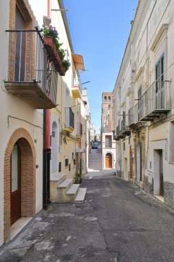A street between the old houses of Ferrandina, a rural village in the Basilicata region, Italy.