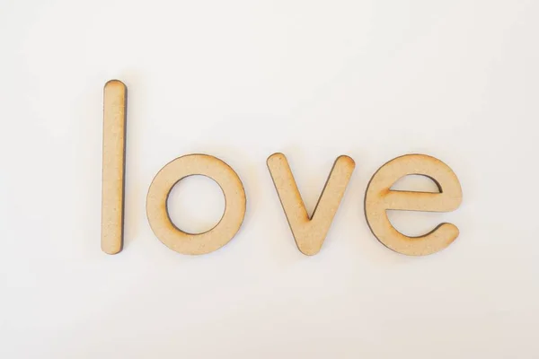 Een Woord Liefde Gemaakt Met Houten Letters — Stockfoto