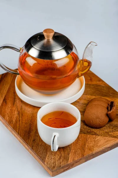 Closeup Shot Teapot Cup Filled Tea Chocolate Cookies Wooden Tray — Stock Photo, Image