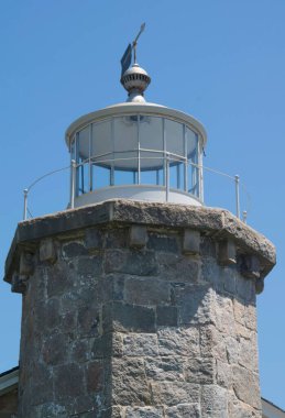 Stonington, Rhode Island 'daki Old Stonington Deniz Feneri' nin dikey çekimi.