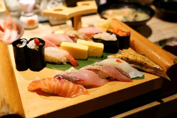 Wooden Board Has Sushi Salmon Shrimp Other Seafood Types — Stock Photo, Image