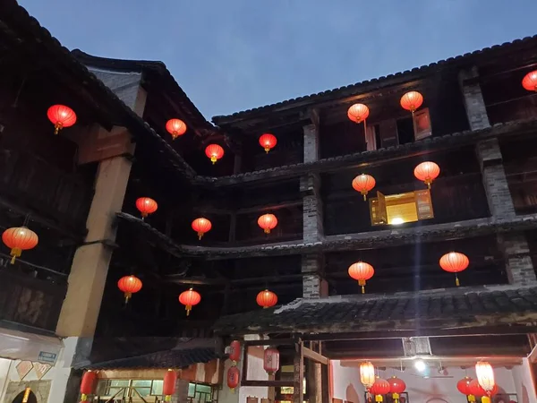 The traditional Chinese style lanterns inside Fujian tulou rectangular building in Fujian, China