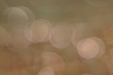 Bej renkli bokeh ışıklarının yakın plan görüntüsü