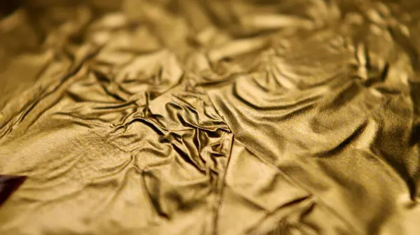 Egy Közeli Felvétel Egy Arany Anyagról — Stock Fotó