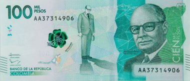 Kolombiya parası, beyaz arka planda yüz bin peso. İş konsepti