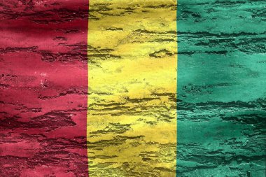 Ahşap kaplama üzerine basılmış bir Gine bayrağı