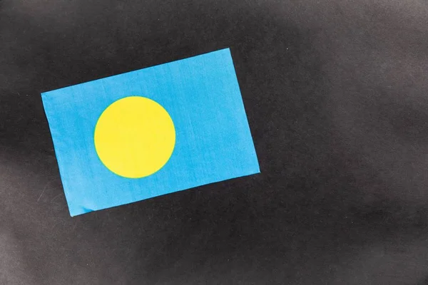 Detailní Záběr Vlajky Palau Tmavém Pozadí Kopírovacím Prostorem — Stock fotografie
