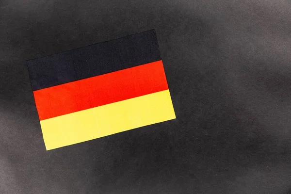 Eine Nahaufnahme Der Flagge Von Deutschland Auf Dunklem Hintergrund Mit — Stockfoto