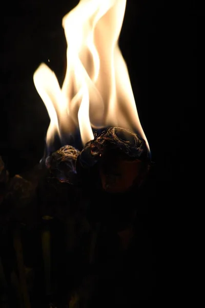 A burning flower on the table