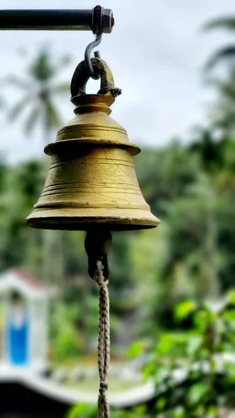 Vertical Shot Old Bell Hanging Air Blurred Background — Stock Photo, Image