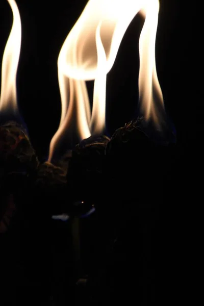 A burning flower on the table
