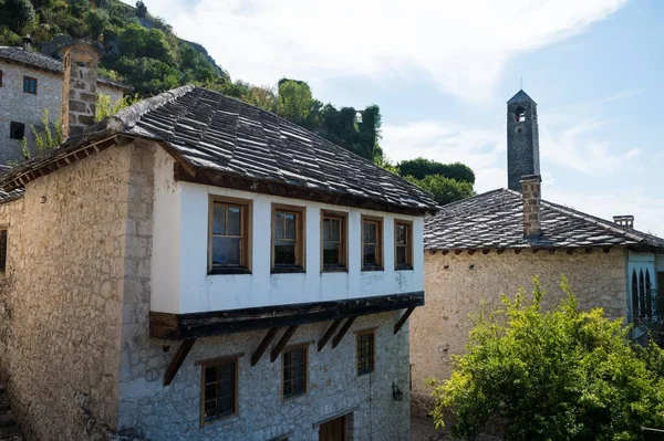 Traditional architecture in Bosnia & Herzegovina that remained since Ottoman empire. An old stone house under blue sky