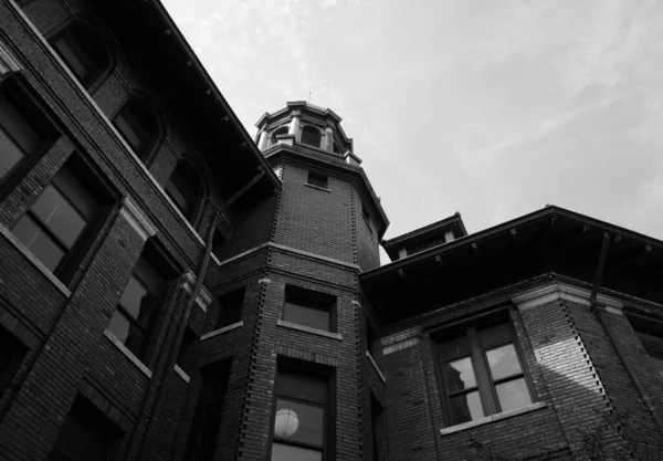 Low Angle Grayscale Old Brick Built Building Sky Background — Stock Photo, Image