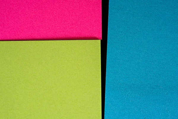 Een Close Shot Van Roze Geel Blauw Papier — Stockfoto