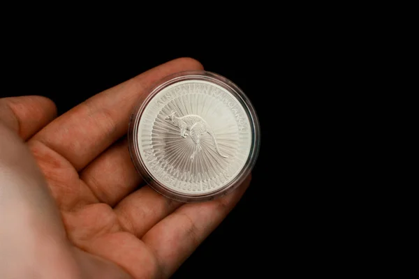 Hand Holding Silver Bullion Coin — Stock Photo, Image