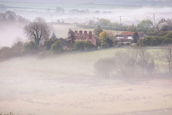 Mesmerizing View Fog Covering Rural Area Field Houses — Stock Photo, Image