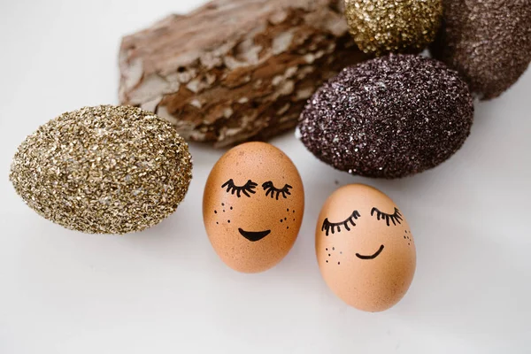 Close Shot Two Eggs Drawn Faces Next Some Stones — Stock Photo, Image