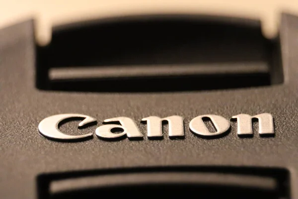 Uma Macro Close Canon Lente Cap Sinal Texto — Fotografia de Stock