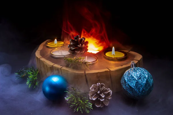 Closeup Shot Christmas Ornate Lit Candles Wooden Board — Stock Photo, Image