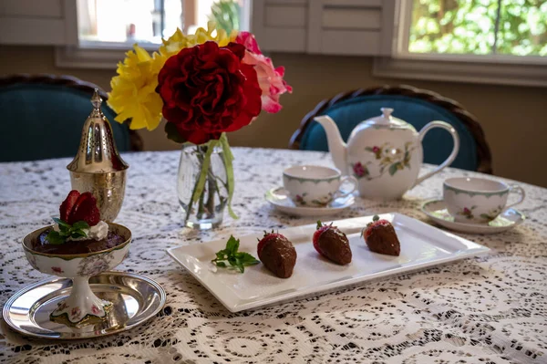 Lovely Little Table Intricate Tablecloth Bearing Colorful Flowers Tea Strawberries — Stock Photo, Image