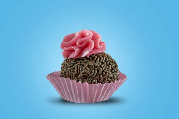 Chocolate Sprinkle Cupcake Pink Frosting Blue Background — Stock Photo, Image