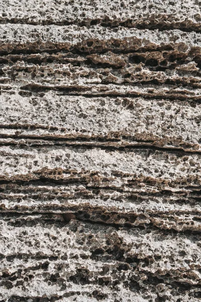 Fechamento Vertical Superfície Pedra Natural Com Furos — Fotografia de Stock